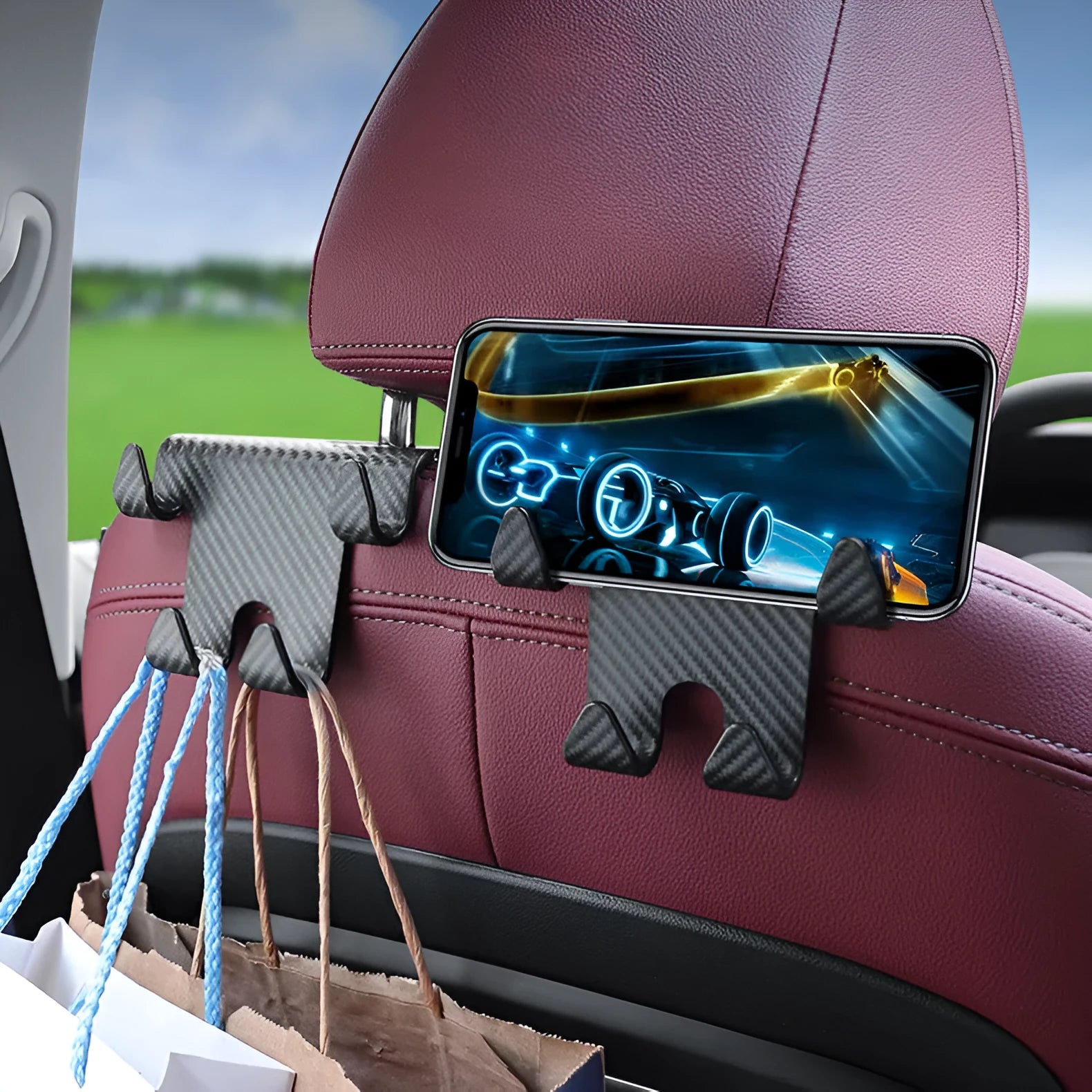 Black ABS plastic car hook with integrated phone holder bracket for rear seat organisation.