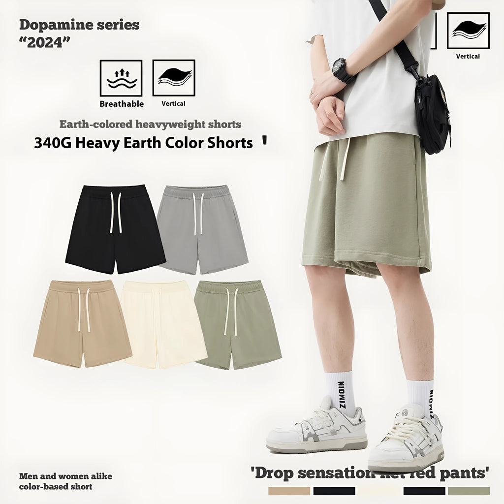 Loose-fit cotton denim shorts for baby or toddler in charcoal grey colour on a hanger.