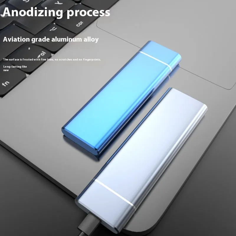Sapphire blue metal external solid state hard disk with USB cable on a white surface