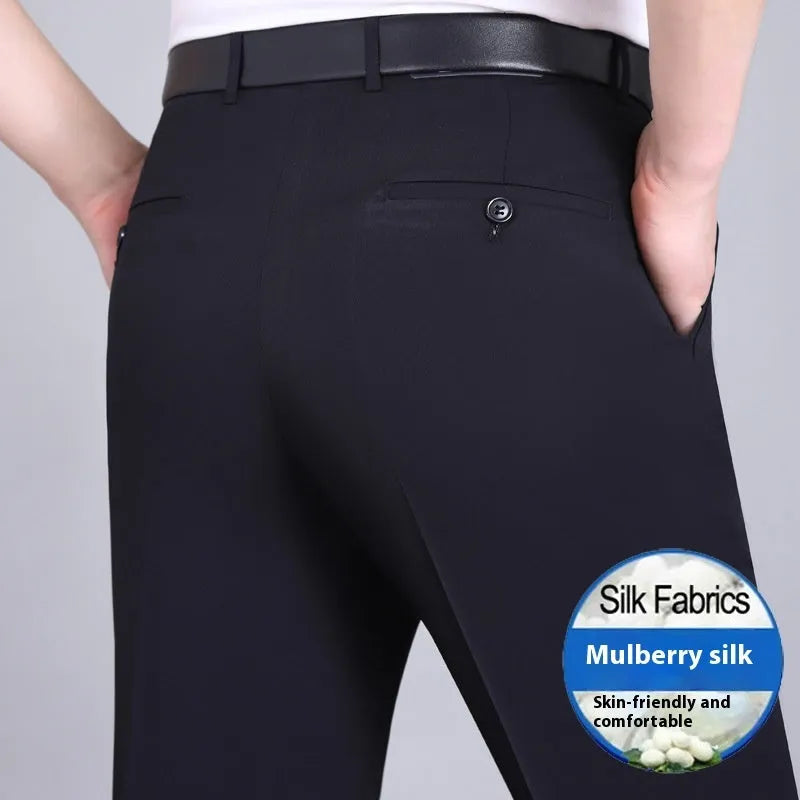 Men's straight-leg mulberry silk blend business trousers in dark blue on a hanger.