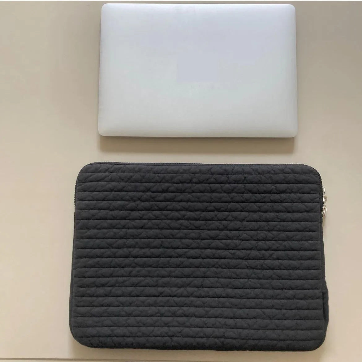 Black and white cotton clutch bag for tablets, shown in 11-inch, 13-14-inch, and 15-15.6-inch sizes with a coin pocket.