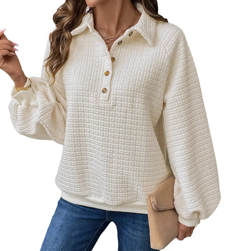 Women's milky white polo collar sweater with long sleeves and textured fabric.