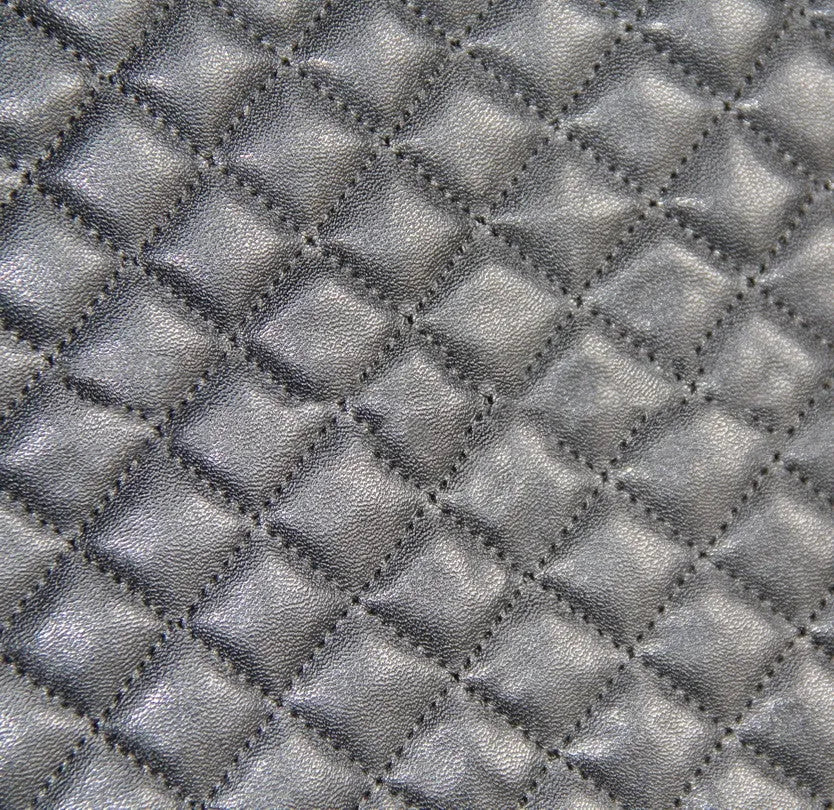 Black quilted automotive seat cover made from PU composite fabric with plastic hooks
