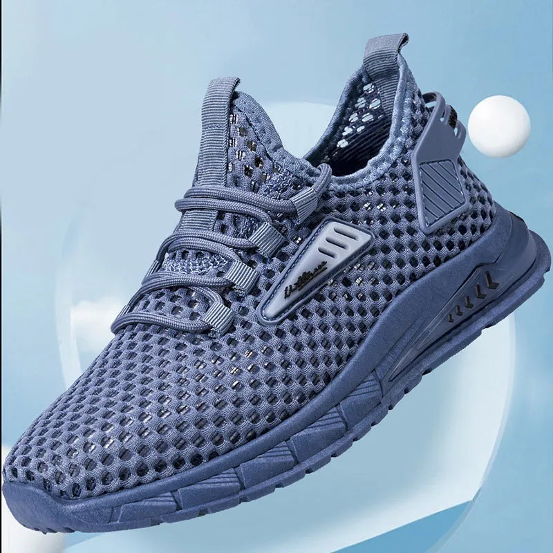 Men's beige casual sneakers with lace-up front, mesh panels, and a flat EVA sole.