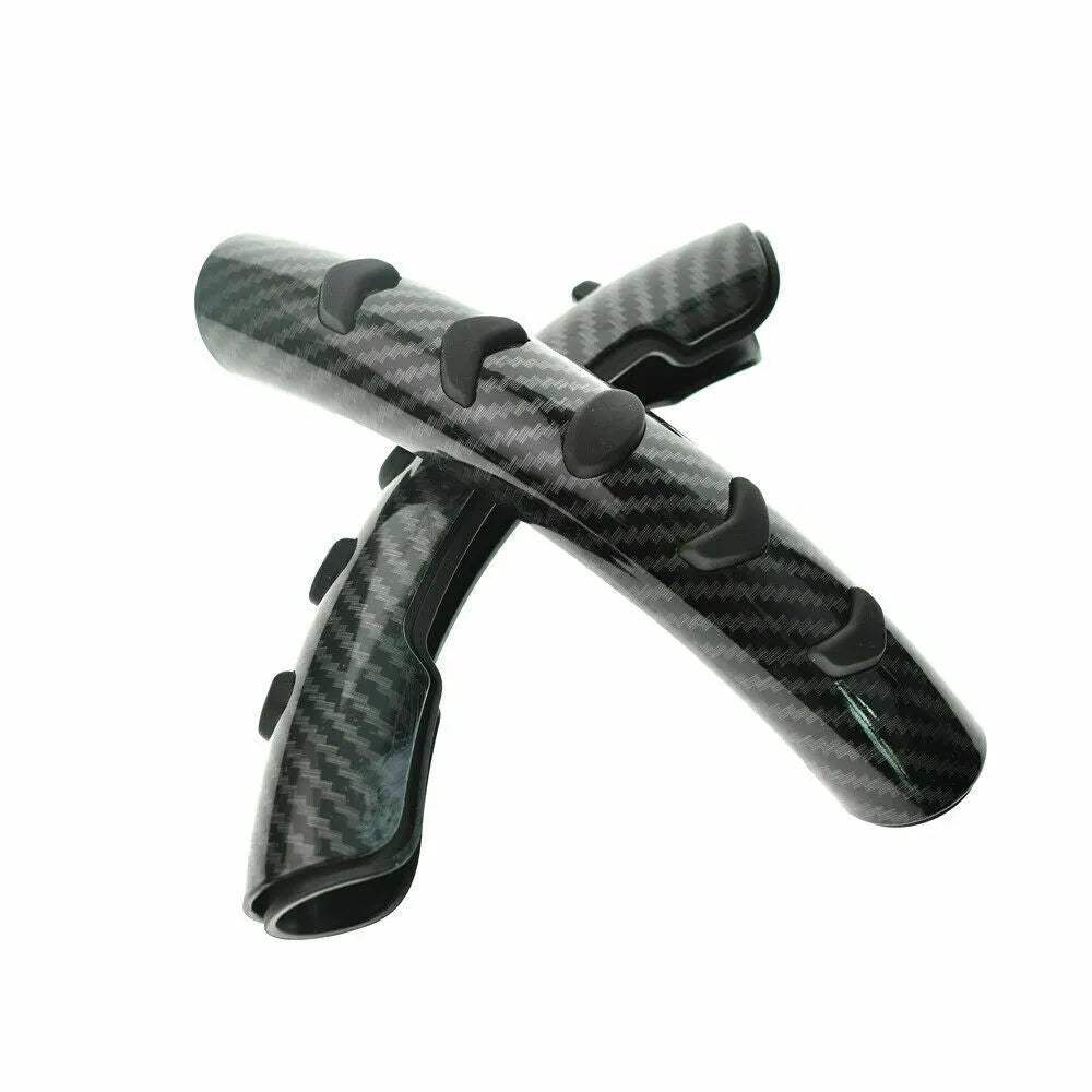 Carbon fibre black fibre anti-skid sleeve on a car steering wheel.