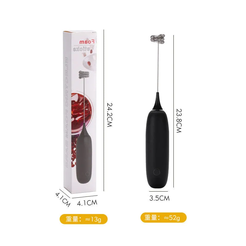 Black and white hand-held electric milk frother blender for coffee