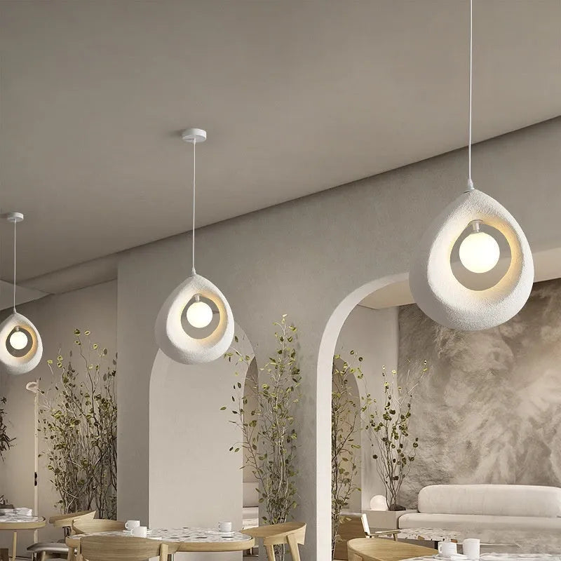 Retro bar chandelier with milky white 32x35cm shade hanging from ceiling