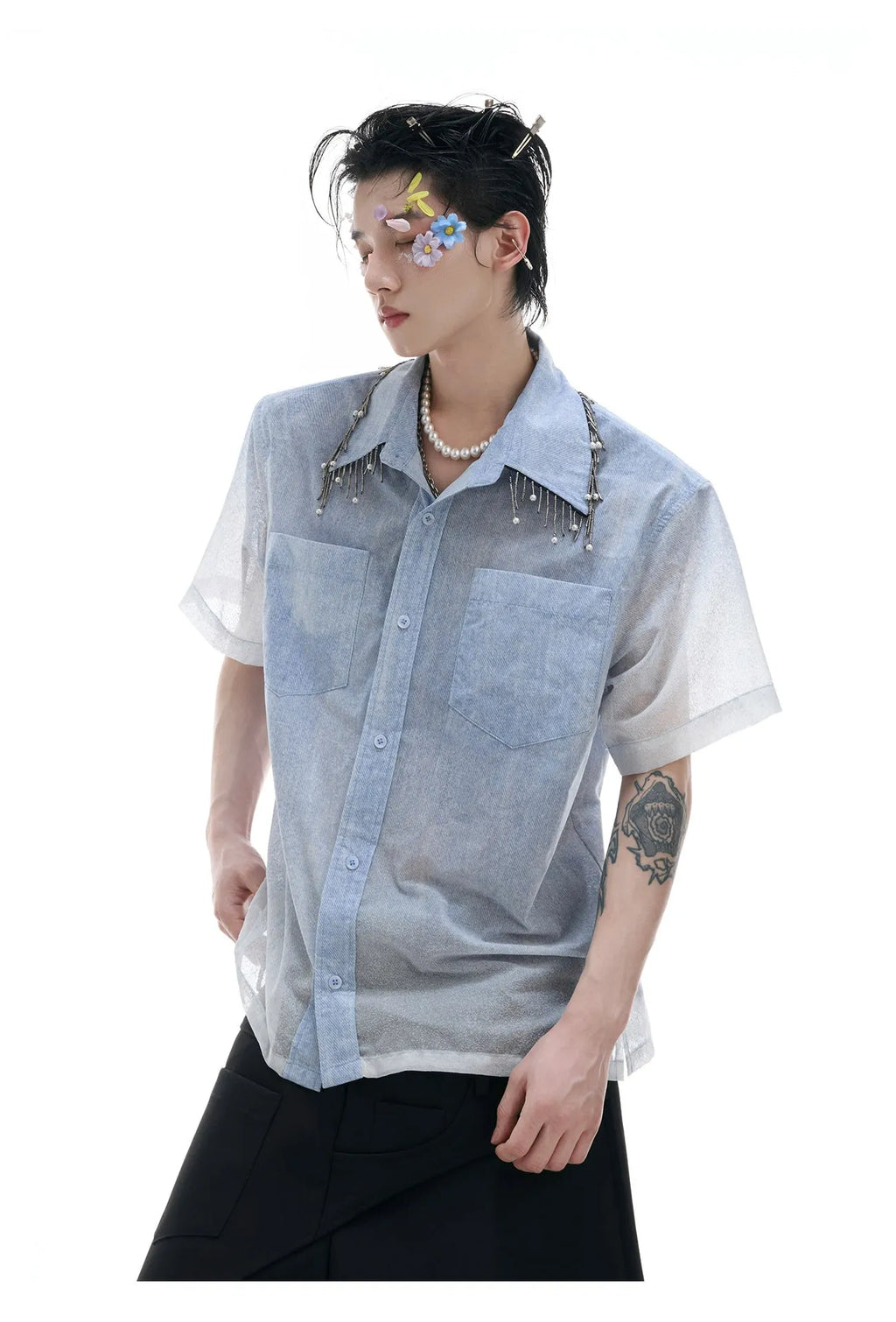 Men's loose fitting blue and white gradient short sleeve shirt with quilted texture.