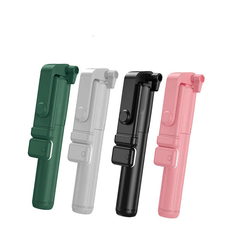 Black Bluetooth selfie stick with extended tripod legs and phone holder, shown with a smartphone attached.
