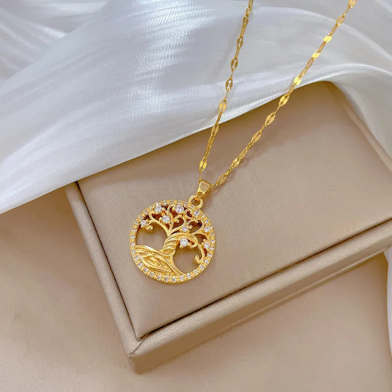 Gold-plated rhinestone lucky tree light necklace with mother-of-pearl detail on adjustable stainless steel chain