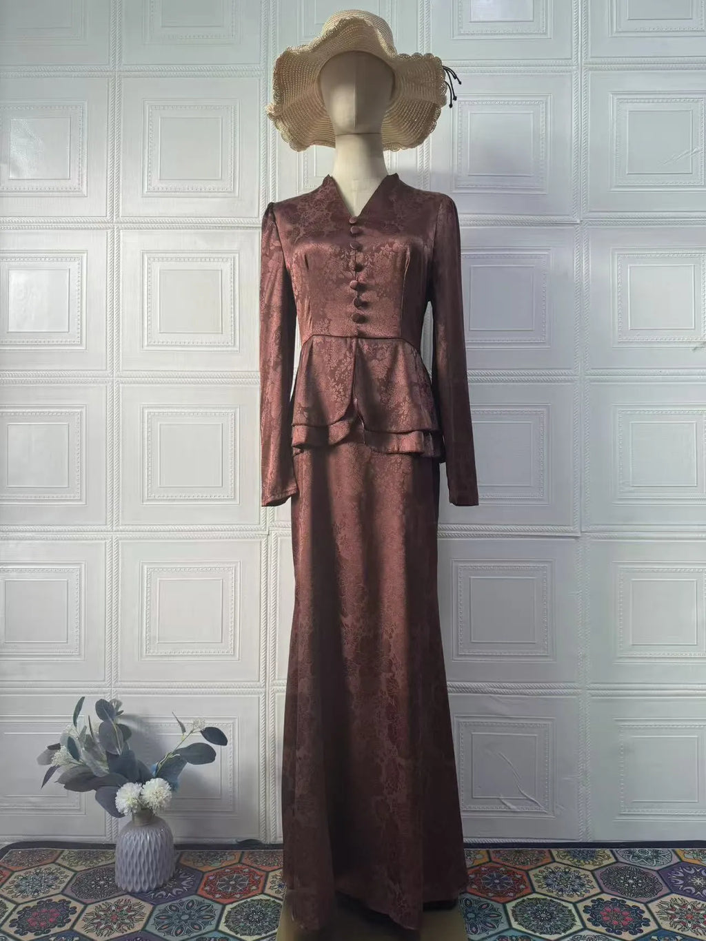 Women's dark brown artistic retro dress with plant pattern and button detailing showing long sleeves and fake two-piece styling