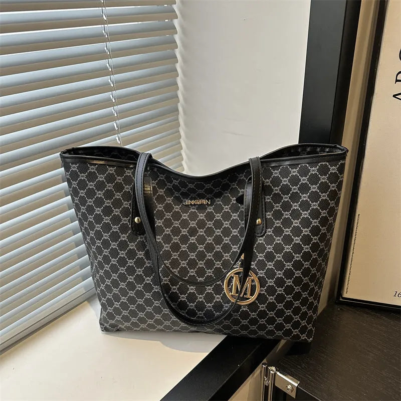 PU leather shoulder bag with adjustable strap in street trend style showing black colour option