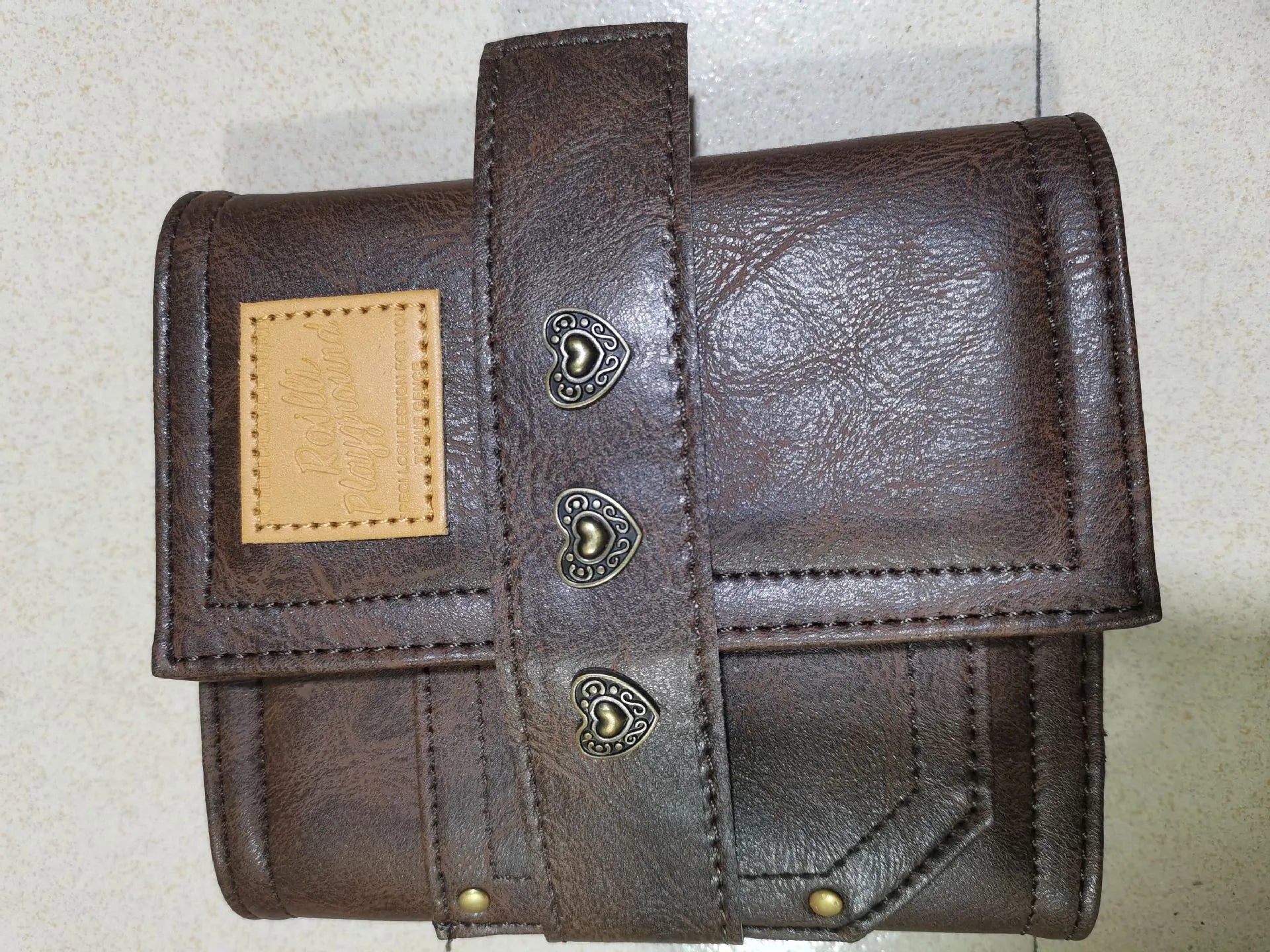 Brown retro leather buckle notebook with A7 size and loose-leaf binding