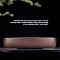 Handmade rectangular purple clay flower pot with antique finish showing natural colour variation