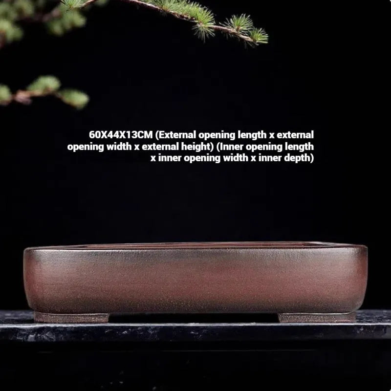 Handmade rectangular purple clay flower pot with antique finish showing natural colour variation