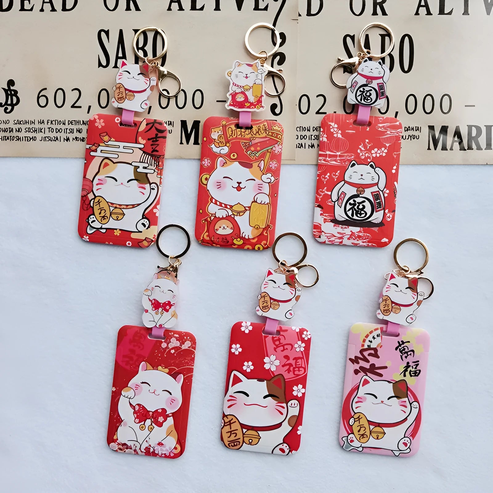 Lucky cat cartoon design plastic certificate sleeve and ferrule pendant set.