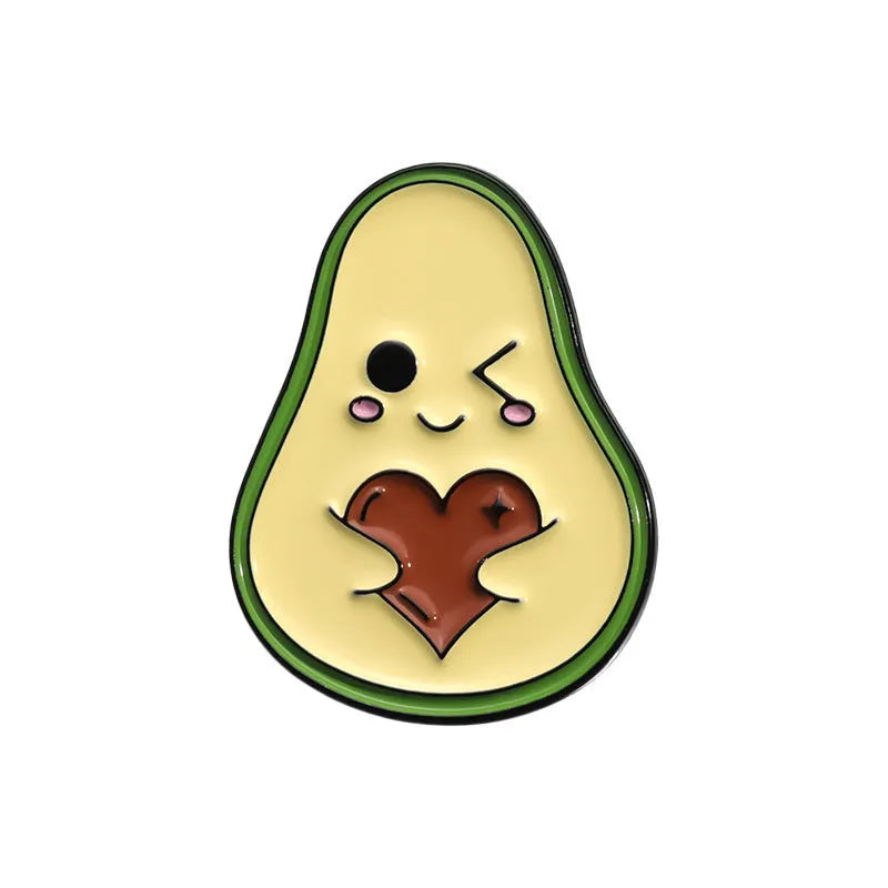 Colourful cartoon fruit design zinc alloy brooch pin on a fabric background.