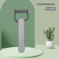 Dog grooming unknotting comb with green PP handle and stainless steel teeth