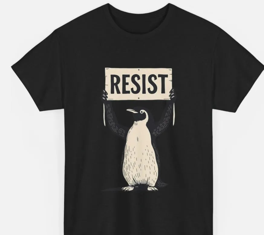 Straight cut loose fit cotton T-shirt in black, green, or white with short sleeves and round neck.