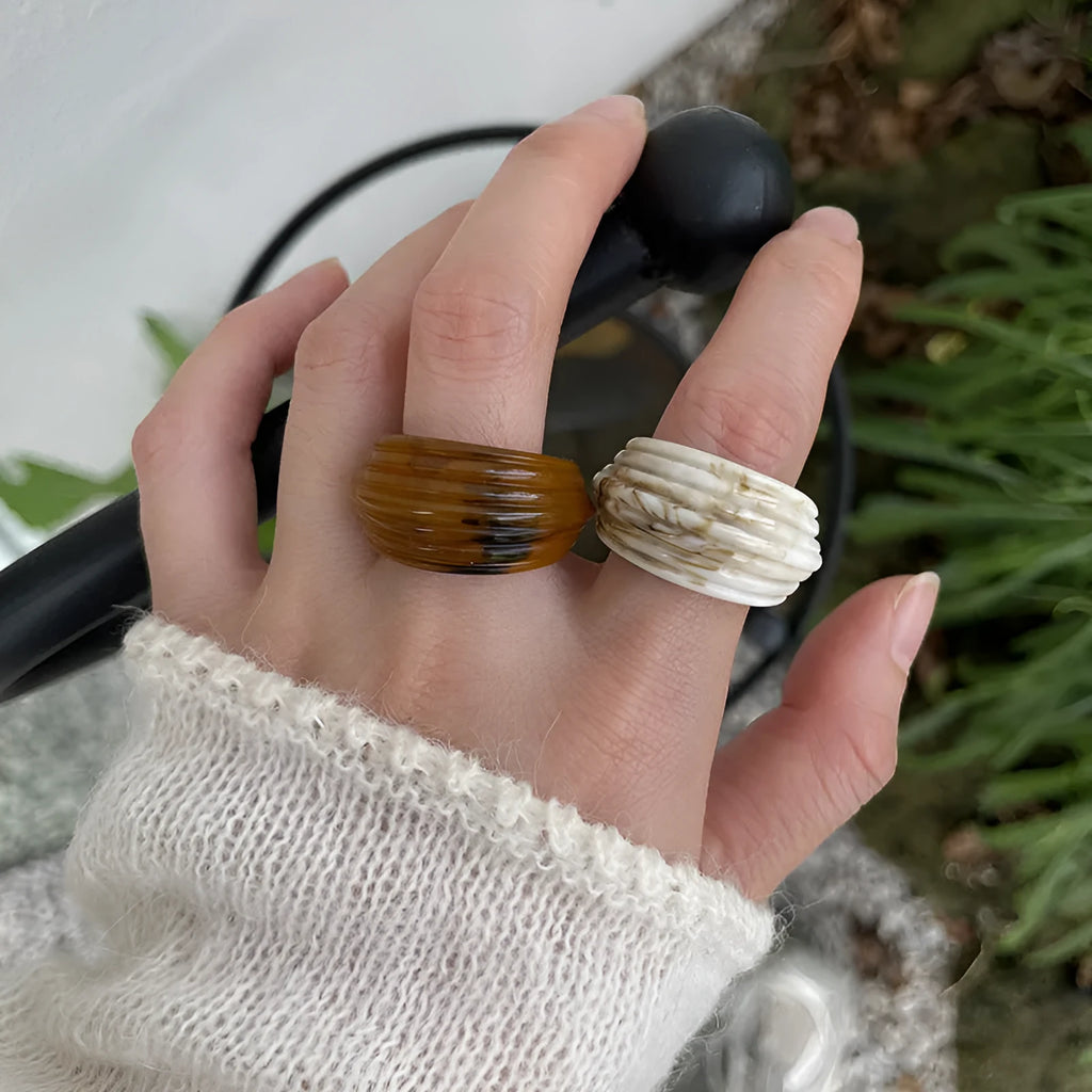 Resin ring with irregular wide band geometric design in Chinese retro style