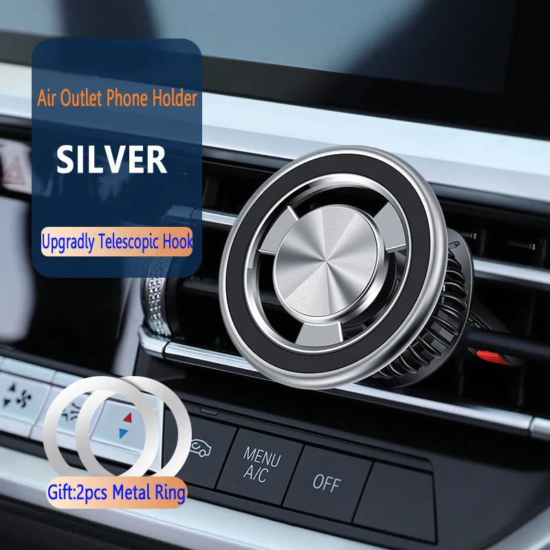 Silver and black magnetic car phone holder with alloy bracket attached to vehicle air vent