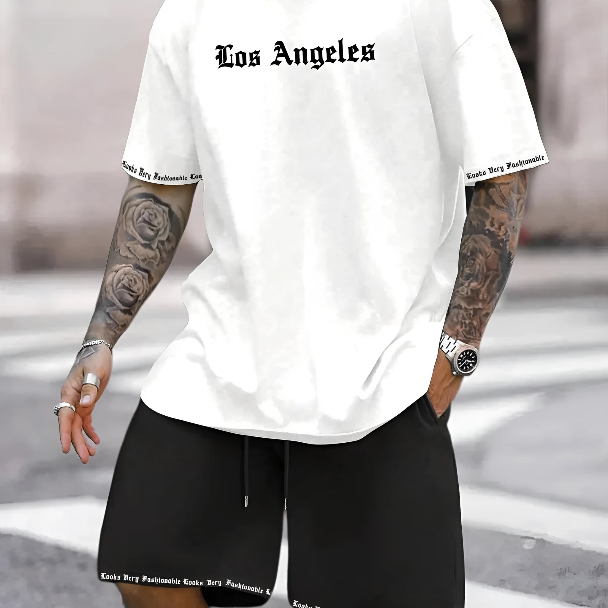 Sports-style short sleeve shirt and matching shorts set in a printed pattern, shown in colour G23P1573.