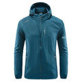 Man wearing a loose-fit light grey hooded nylon jacket for summer sun protection.