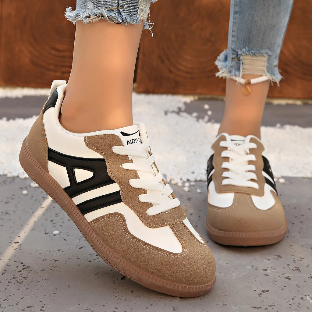 Women's retro colour matching lace-up jogging shoes in grey with a round toe and platform sole.