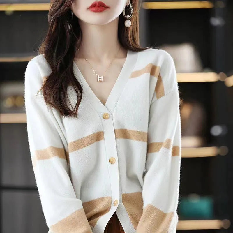 Women's striped V-neck knitted cardigan with 3D pattern in camel colour.