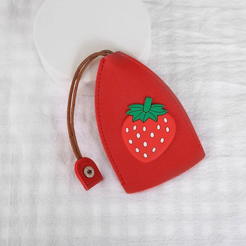 Cartoon pull-out key case in PU leather measuring 14 by 7.5 centimetres