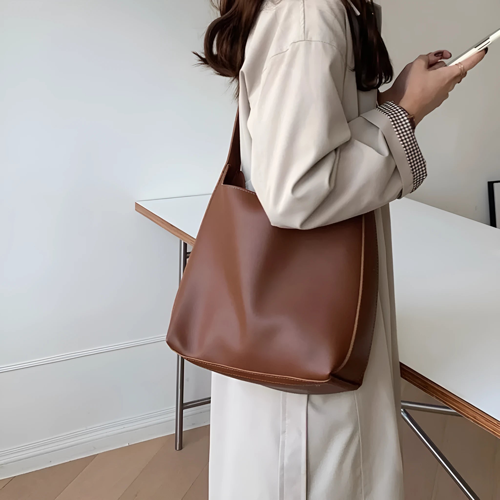 Soft PU leather shoulder bag with swing threads decoration in black or brown colour