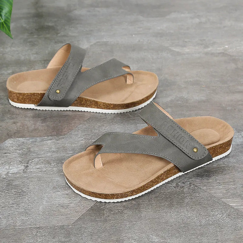 Blue flat toe ring flip-flops with a thick foam sole on a solid background.