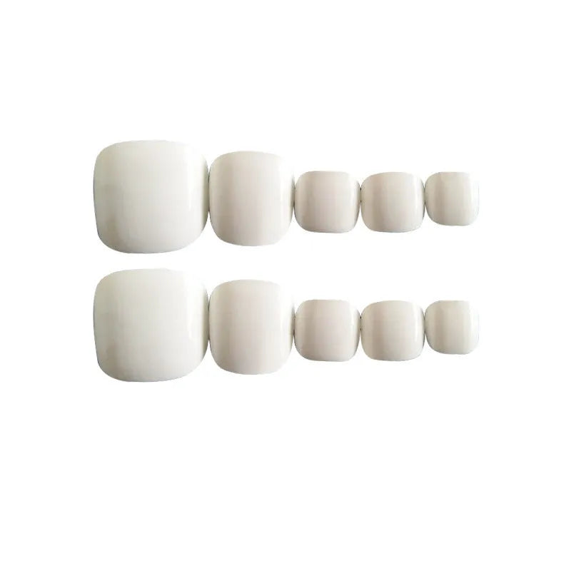 White false nails with a starry sky pattern, a complete manicure set for ladies.