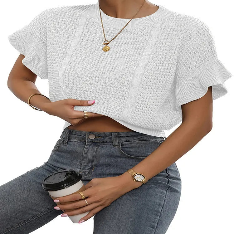 Knitted loose pullover sweater with ruffled short sleeves and a 3D twisted string pattern, shown in a neutral colour.