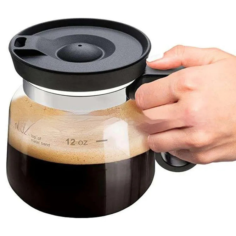 Transparent borosilicate glass coffee maker with silicone cover showing 355ml-473ml capacity