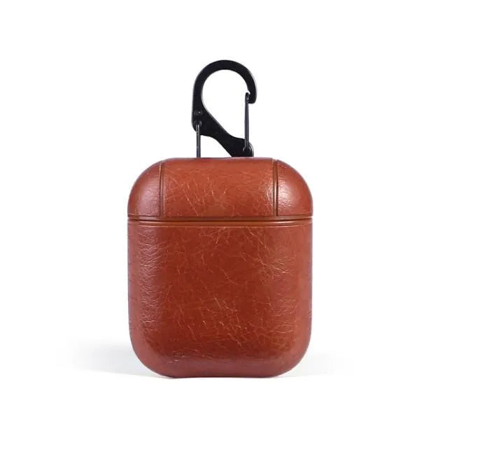 Genuine leather protective pouch for Apple Airpods charging case in black, brown, light brown, and red colours.