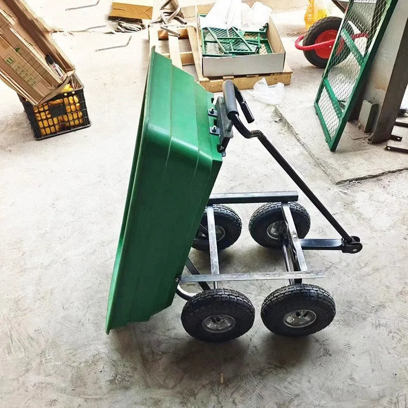 Green four-wheel agricultural dump truck with tipping bed, model TC2145, for hauling materials.