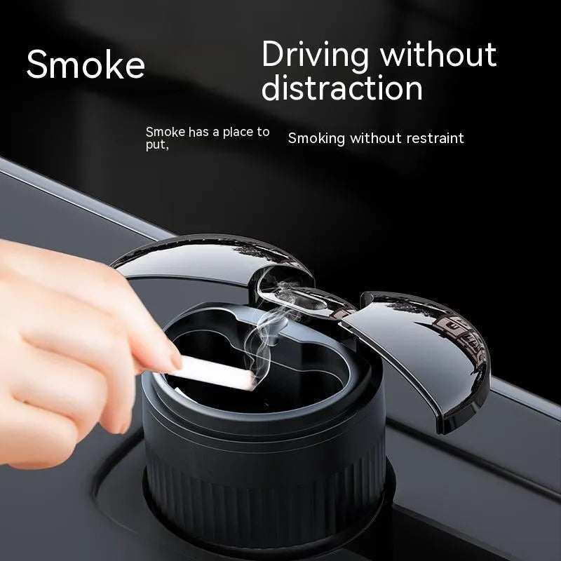 Black automatic sensing touch infrared metal car ashtray with lid on a car console.