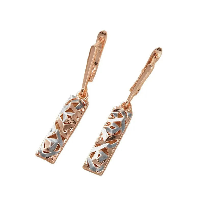 Rectangular two-tone hollow stud earrings for women with a geometric design and picture style finish.