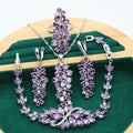 Retro jewellery set with plant pattern design showing necklace, bracelet, earrings, and ring in alloy and copper zircon