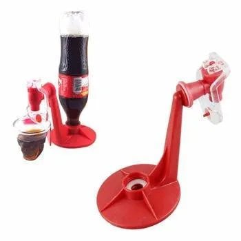 Red plastic Magic Tap soda dispenser attached to inverted 2-litre bottle