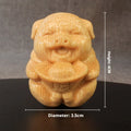 Solid bamboo pig carving ornament measuring 4cm tall with 3.5cm diameter
