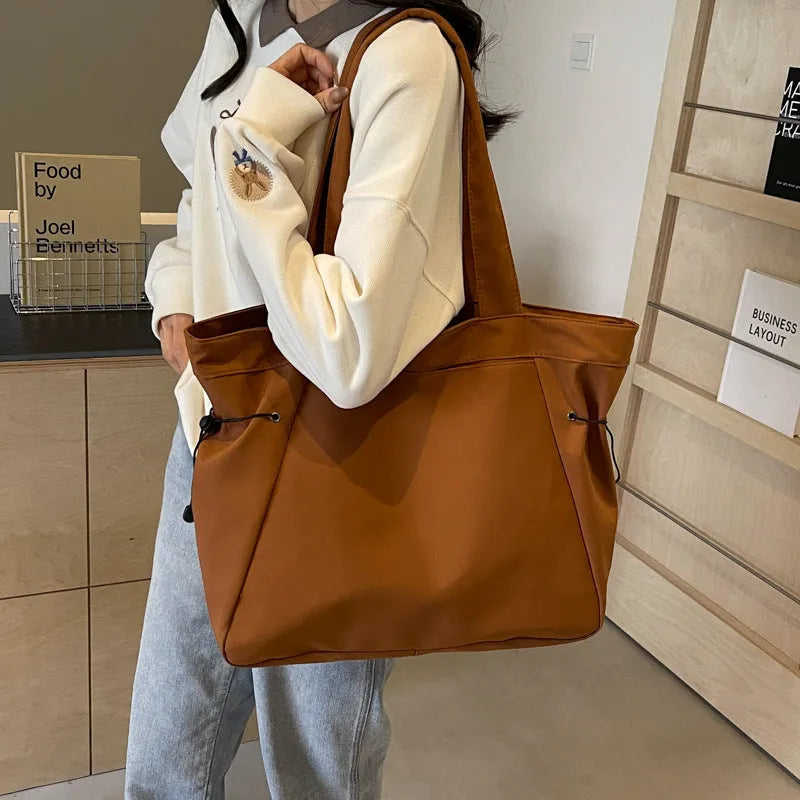 Soft Oxford cloth folding tote bag in street trend style shown in multiple colour options