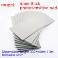 Black and grey plastic photosensitive mat for seal pottery, showing 330mm by 110mm sheet size.