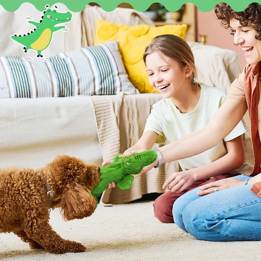 Green crocodile-shaped plush dog toy with no stuffing, squeaker in head, and crinkle paper in tail