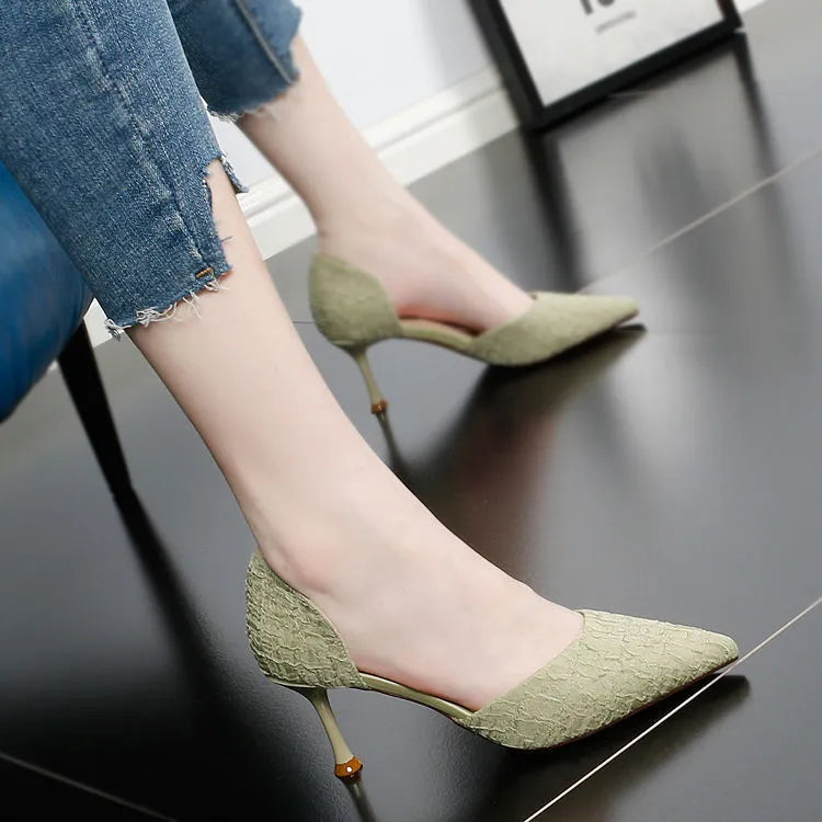 Women's black pointed toe stiletto high heels with a plain PU leather upper.