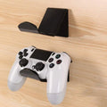 A universal game controller mounting bracket in a choice of black, white, or transparent colours.