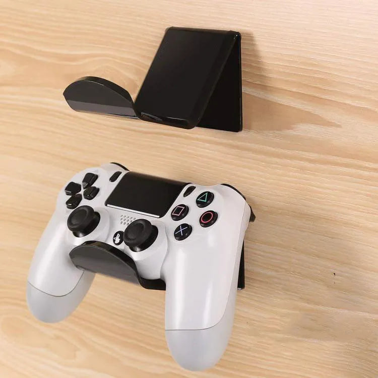 A universal game controller mounting bracket in a choice of black, white, or transparent colours.