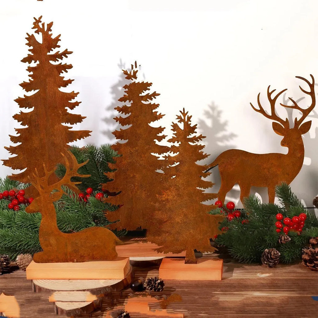 Set of three rusty iron Christmas tree ornaments on a wooden surface