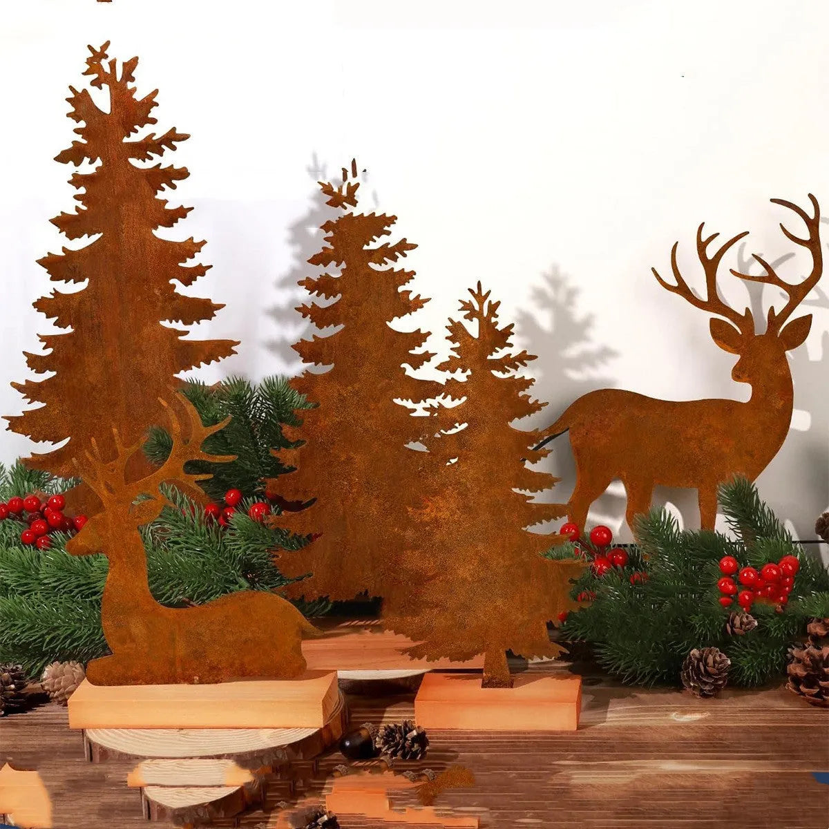 Set of three rusty iron Christmas tree ornaments on a wooden surface